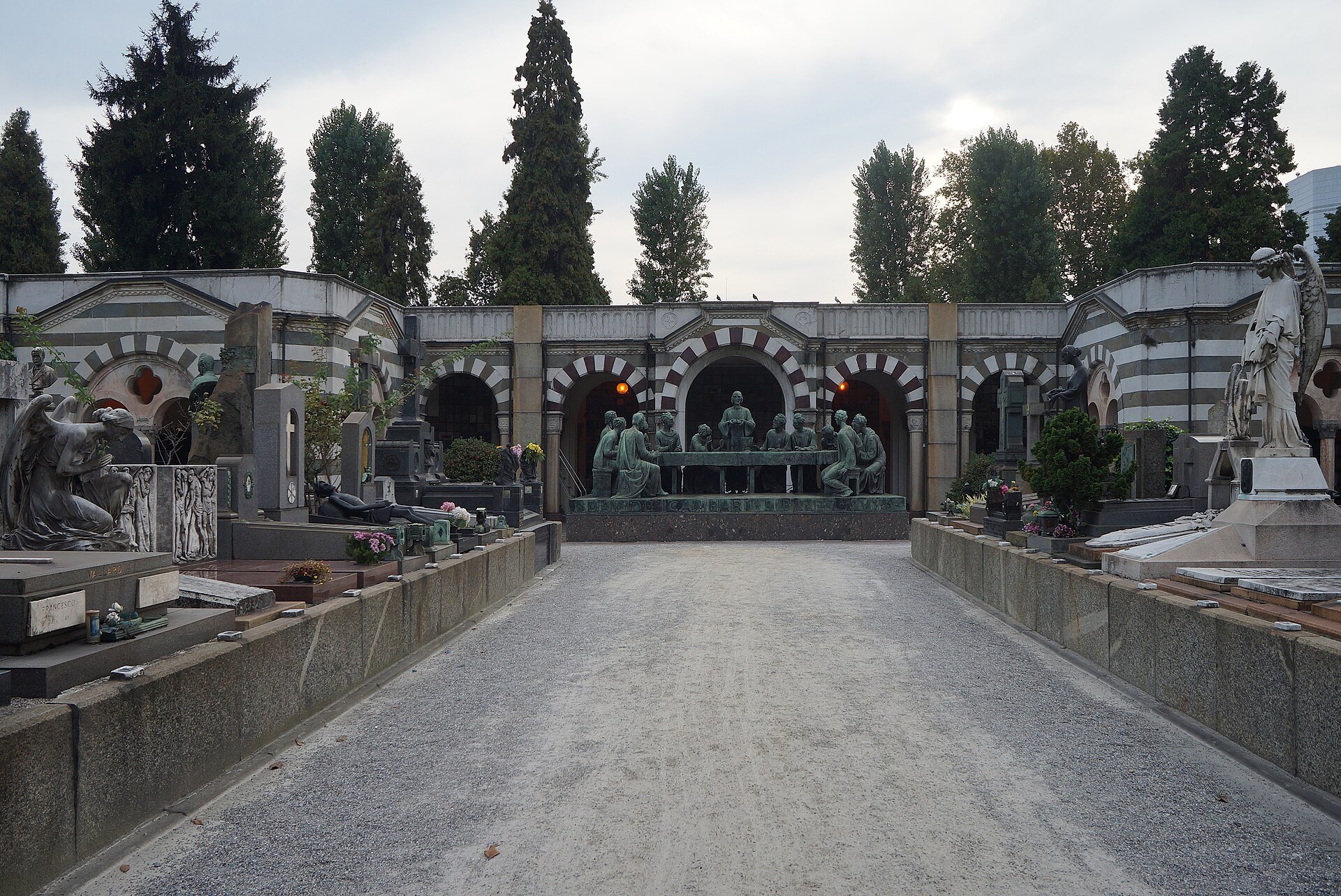 The Campari family tomb, a bronze Last Supper set into a stone screen