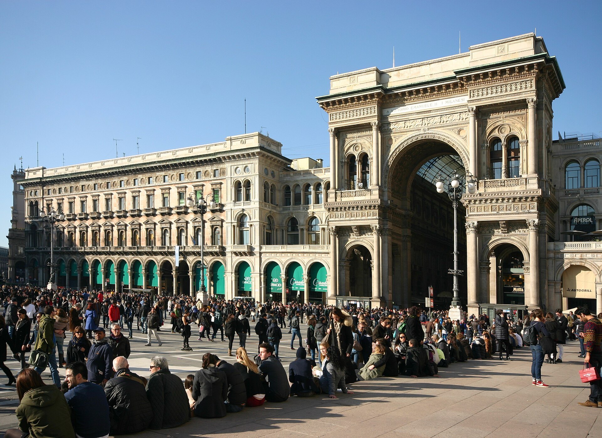 The Galleria entrance seen across the square with a crowd in front of it