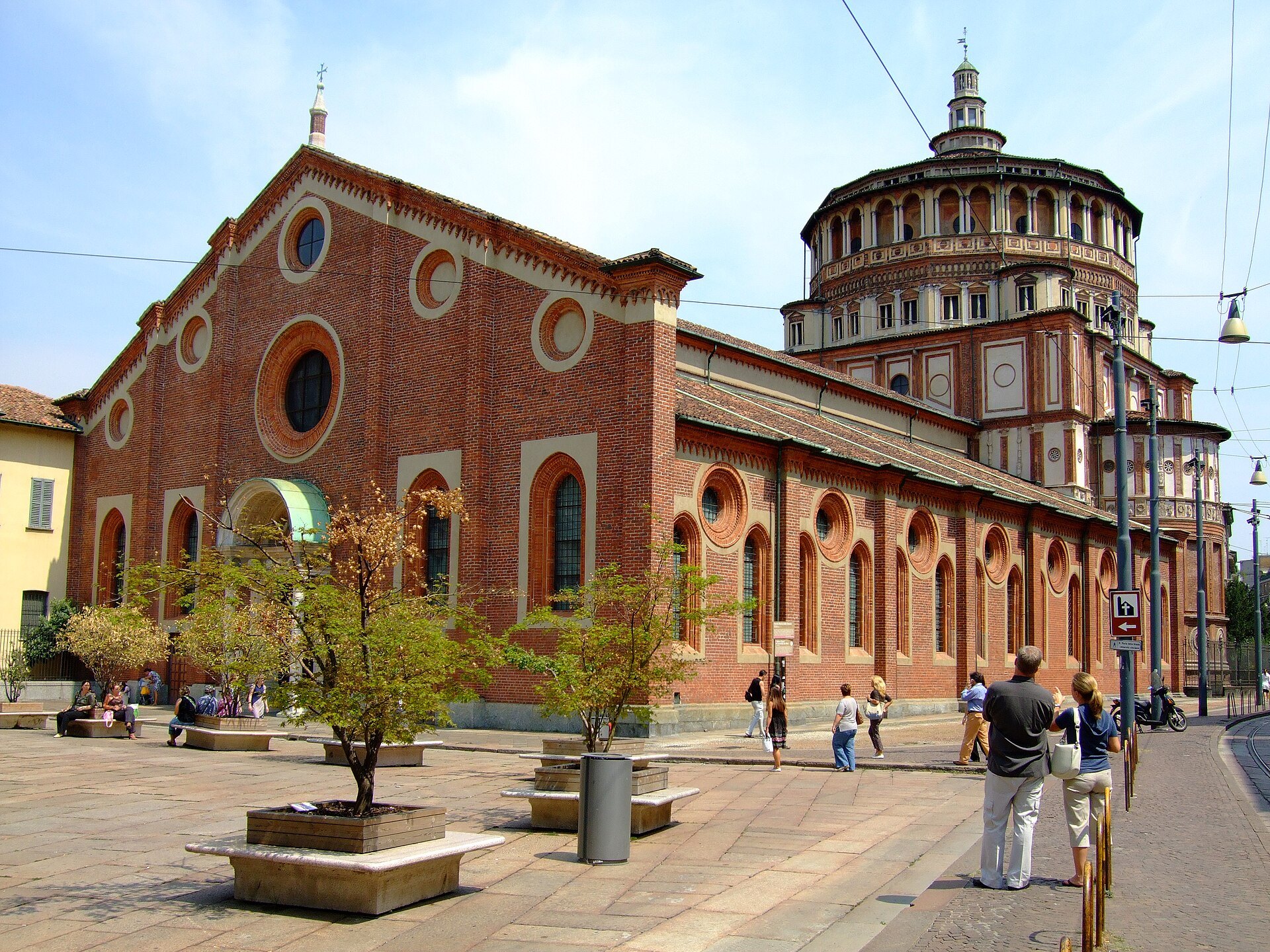 The brick church of Santa Maria delle Grazie with Bramante's ribbed tribune behind it