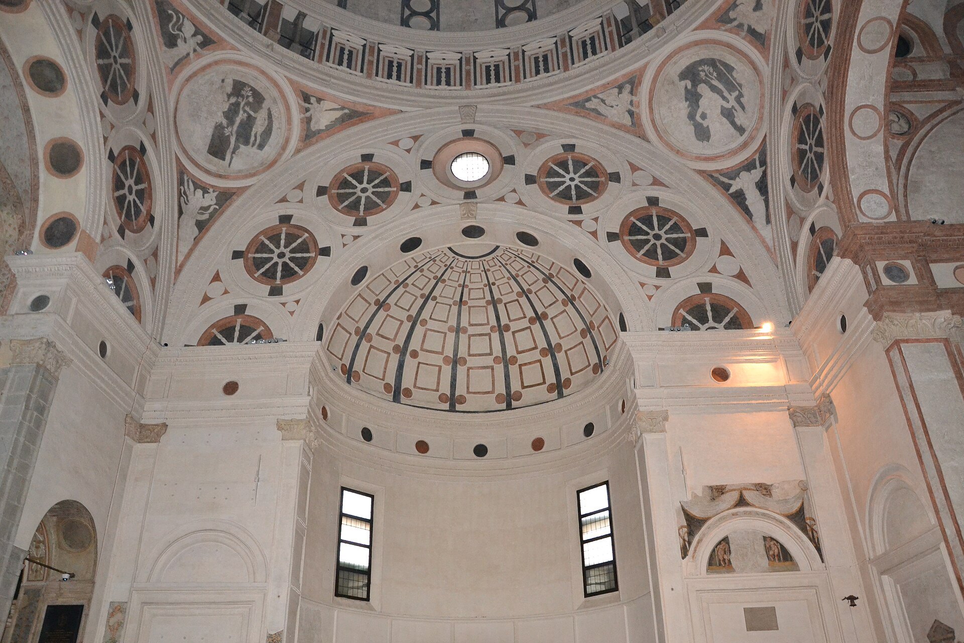Looking up inside Bramante's tribune at the dome and the surrounding vaults