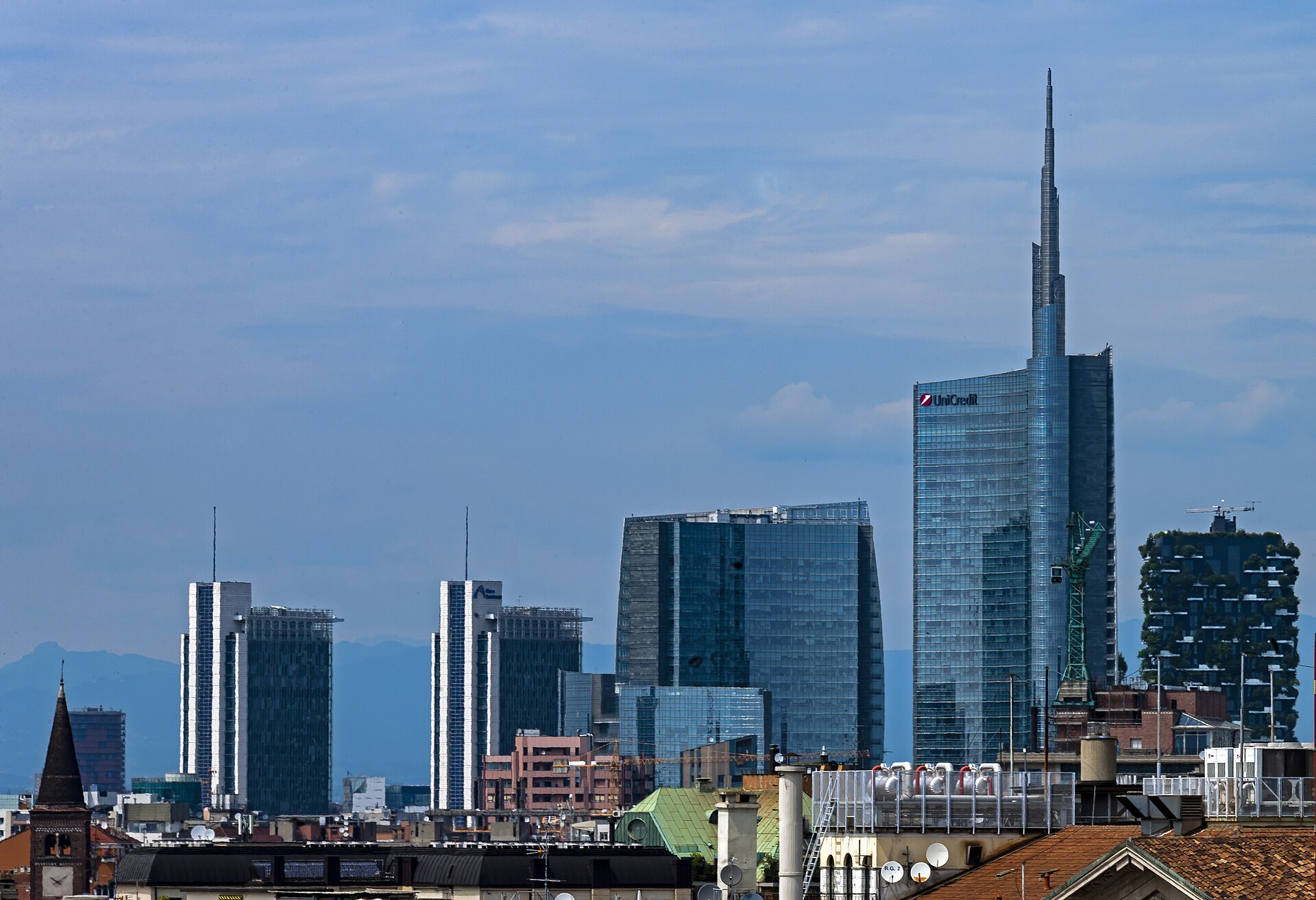 The Porta Nuova skyline with the Unicredit Tower's spire above the older rooftops