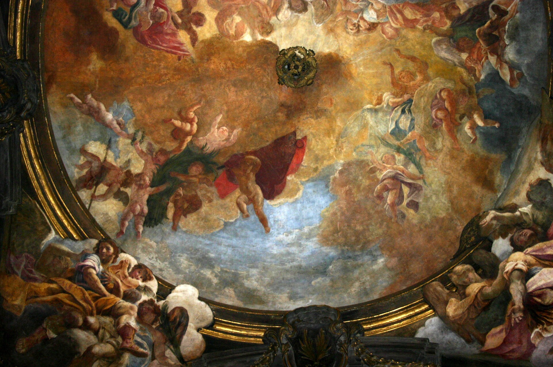 The painted ceiling above the ossuary, a rococo fresco of figures in cloud