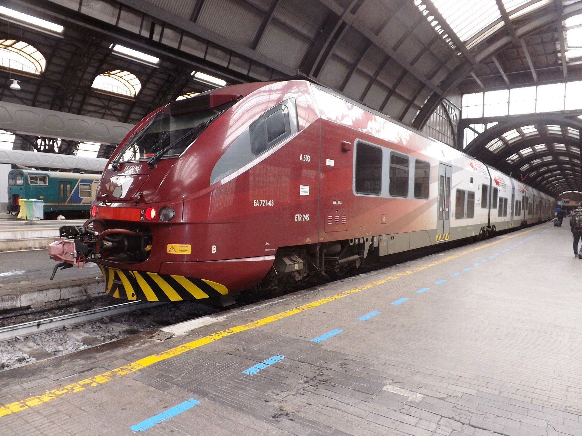 A Malpensa Express train at the platform under the vault of Milano Centrale