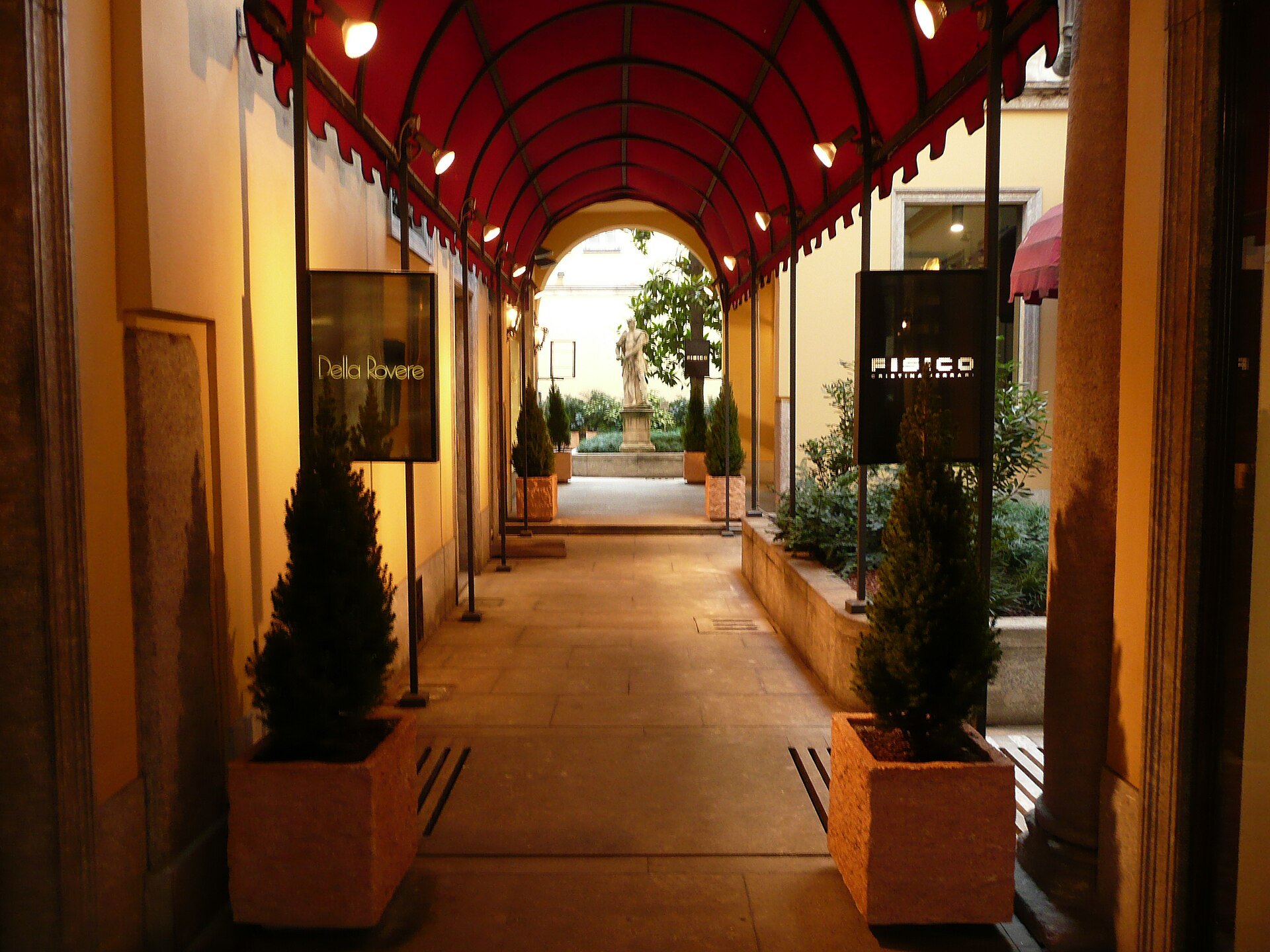 A covered passage between shops in the Quadrilatero, awning overhead