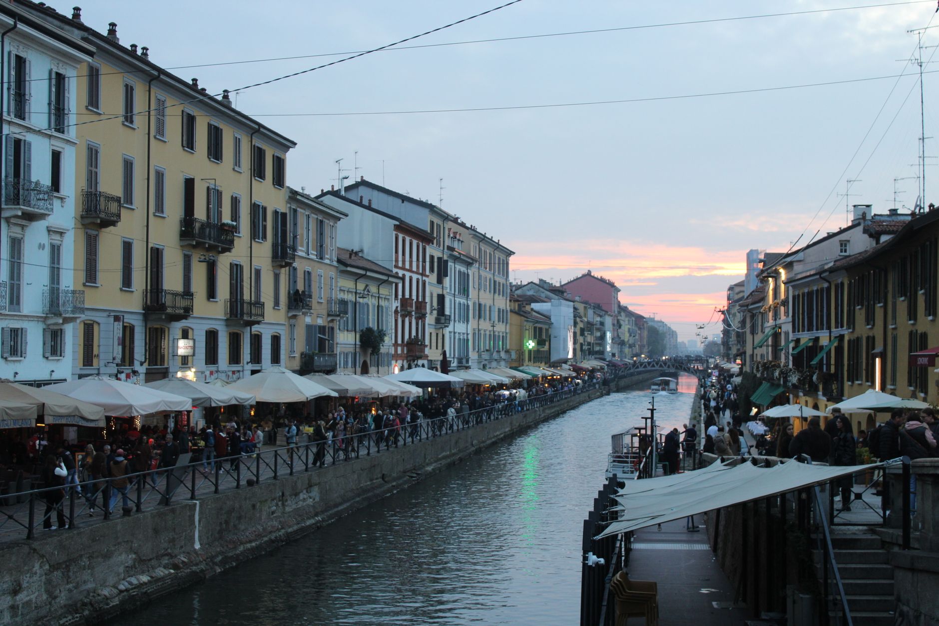 Naviglio Grande canal in Milan with street life